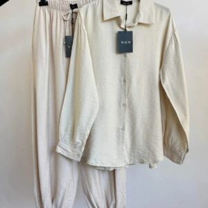 Tweedelige set wauw beige maat 40 - 44.